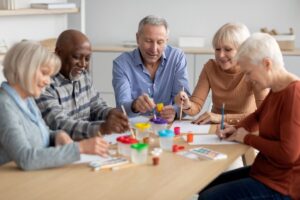 Group of seniors doing arts and crafts together